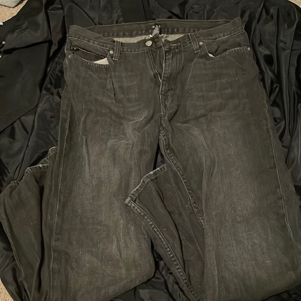 faded black denim jeans